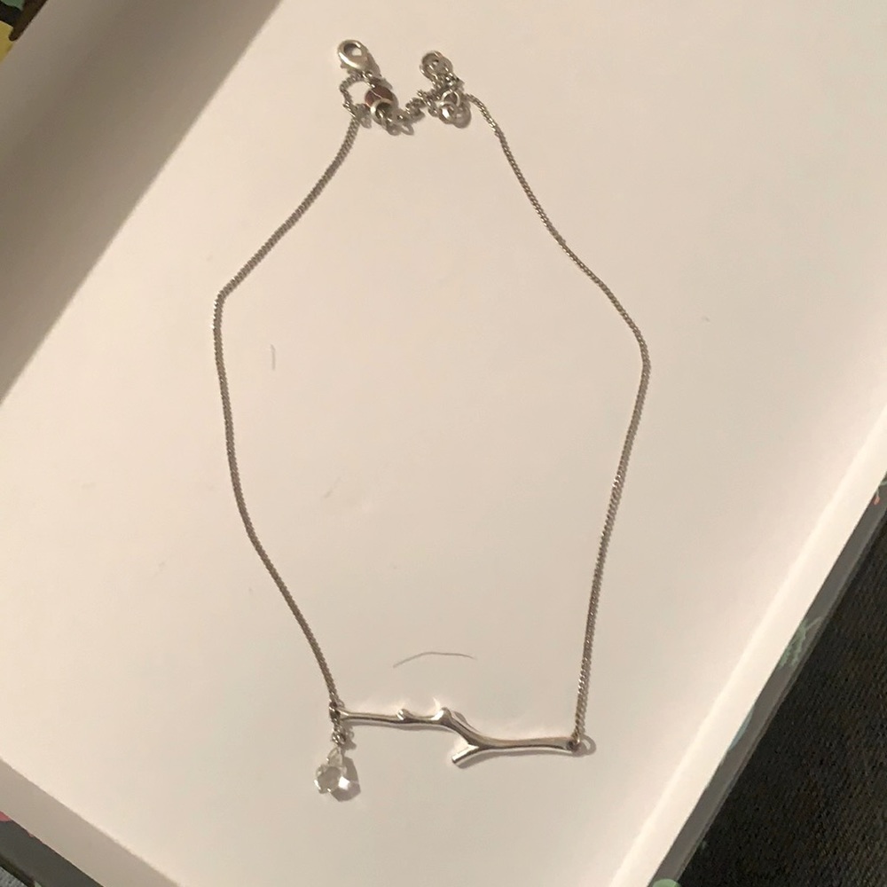 Chloe and Isabel rhodium plated branch necklace with single crystal raindrop.